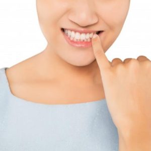 دندان لق در کودکان و بزرگسالان | نخ دندان مینا