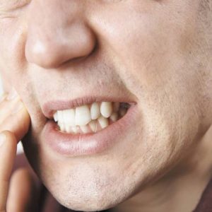 معرفی دلایل و علائم تحلیل استخوان فک | نخ دندان مینا